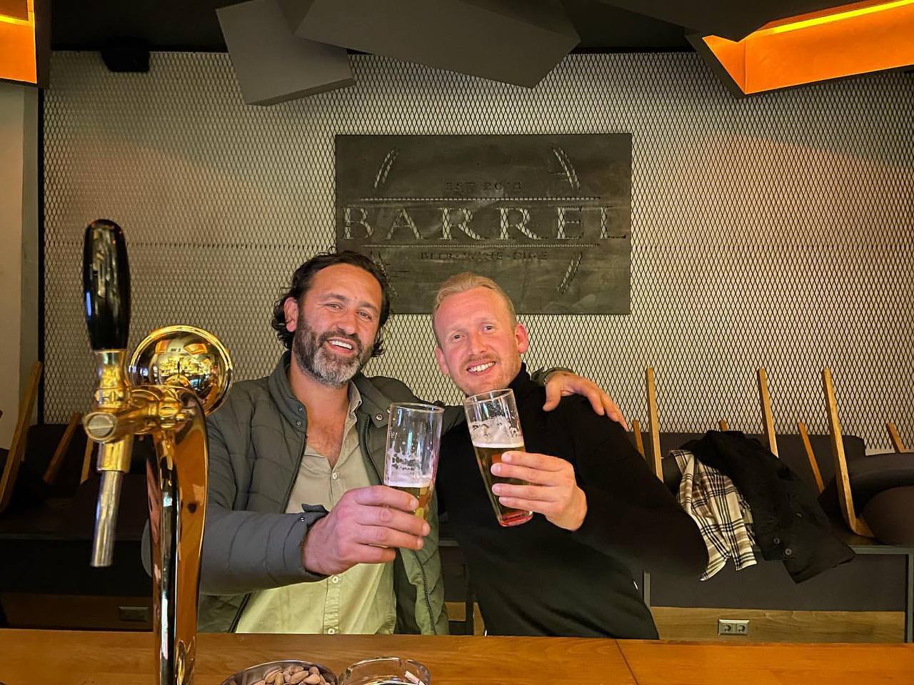 Andreas and a guest at the Barrel bar